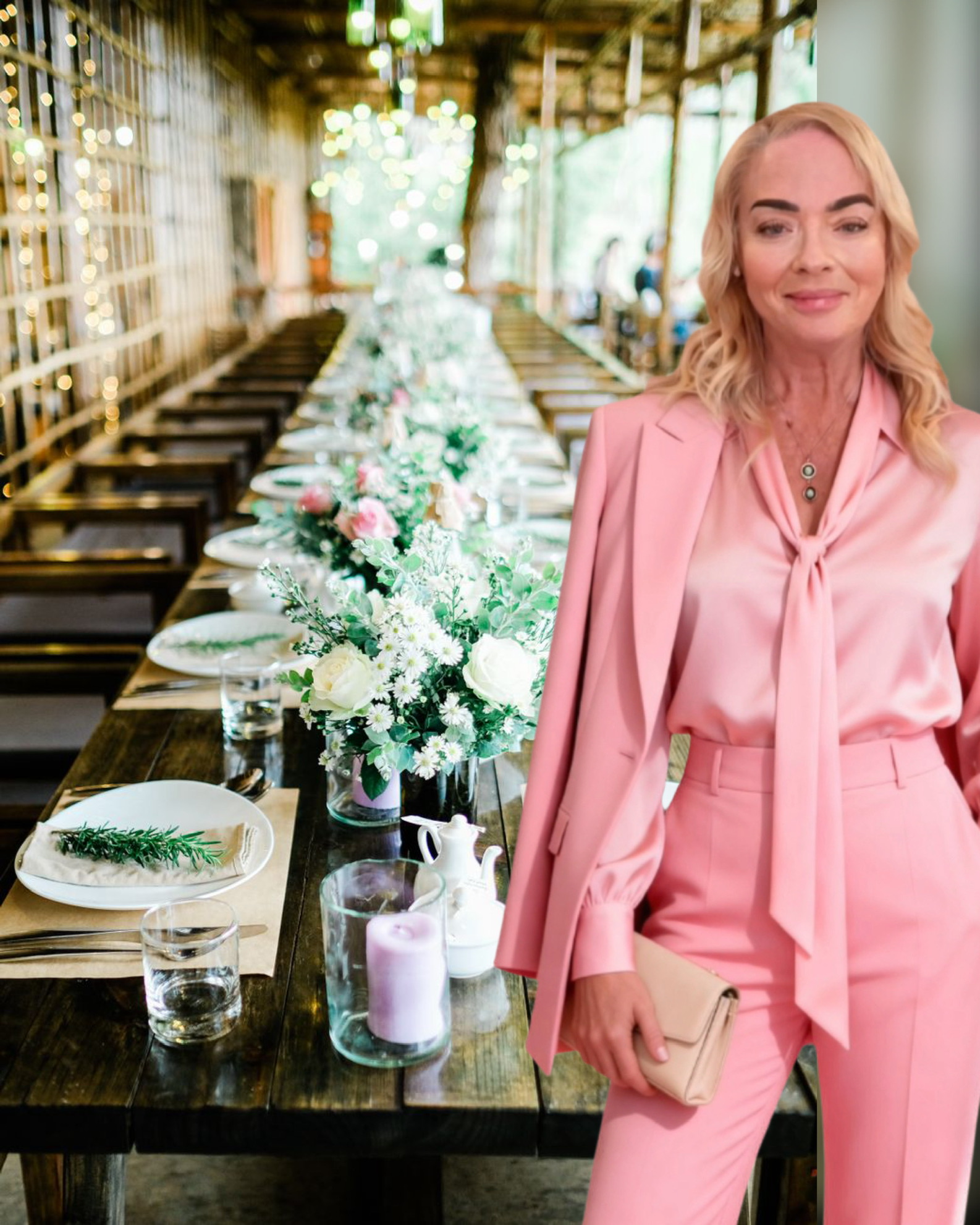 Sandy Kamper in pink beside an elegantly set high tea table, with her full head visible